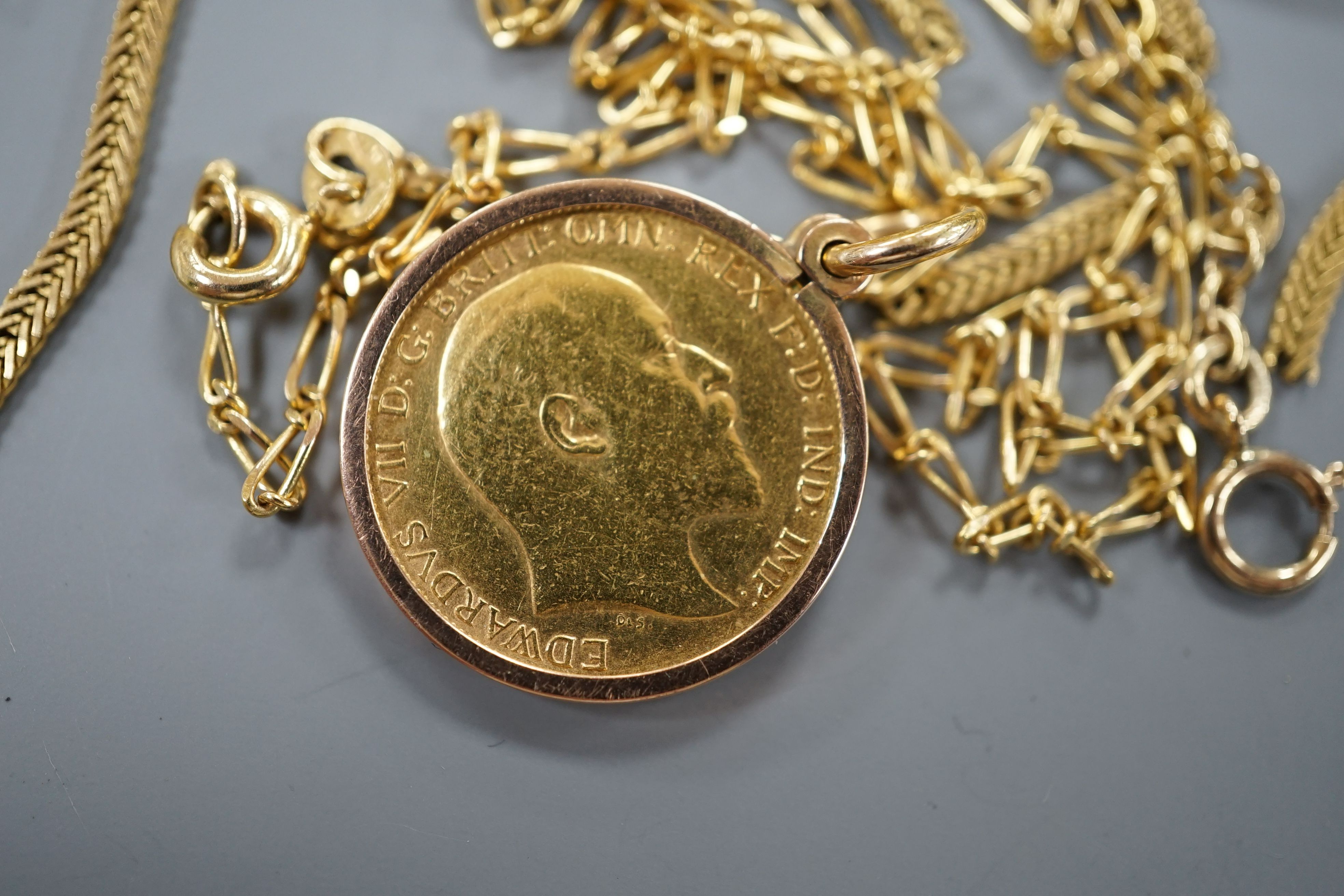 A 1908 gold half sovereign in unmarked mount, three assorted 9ct gold necklaces, one a.f.; a Victorian ring and a heart shaped locket, gross 30.4 grams